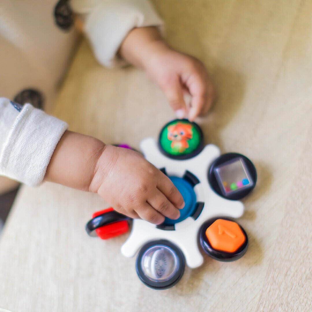 Baby Einstein jucarie senzoriala Curiosity Clutch Twist & Pop Rattle Teether 3m+