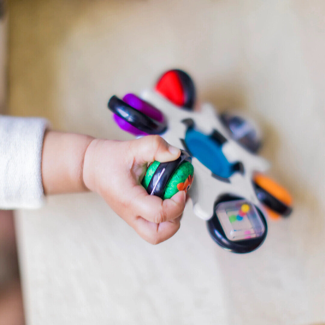Baby Einstein jucarie senzoriala Curiosity Clutch Twist & Pop Rattle Teether 3m+