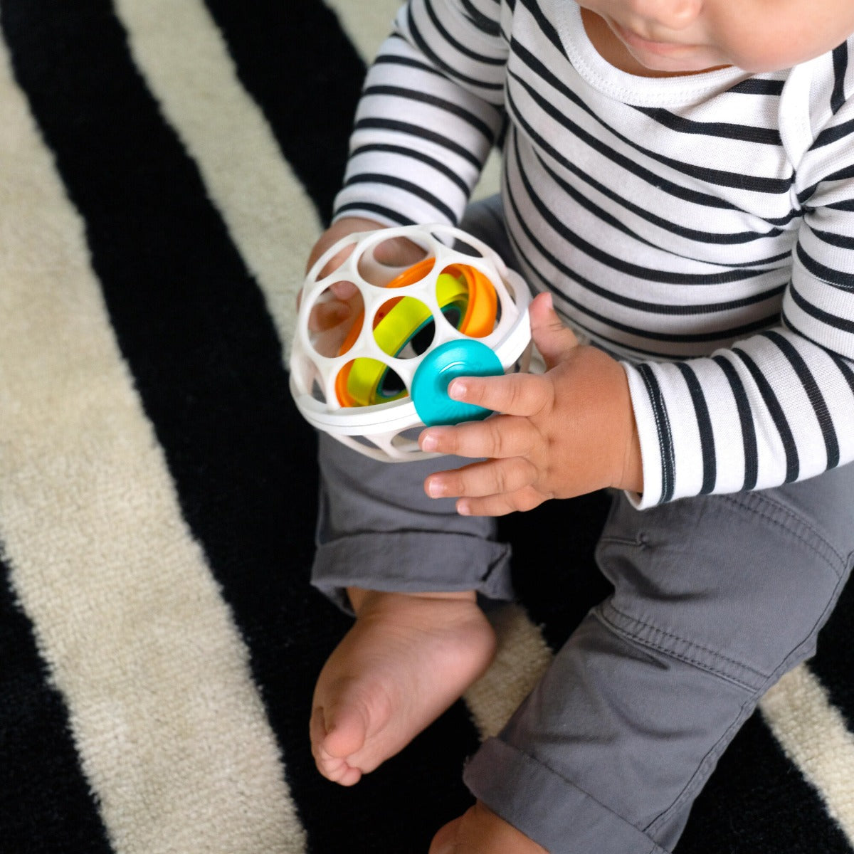 Baby Einstein minge zornaitoare Oball Grip&Spin 0m+