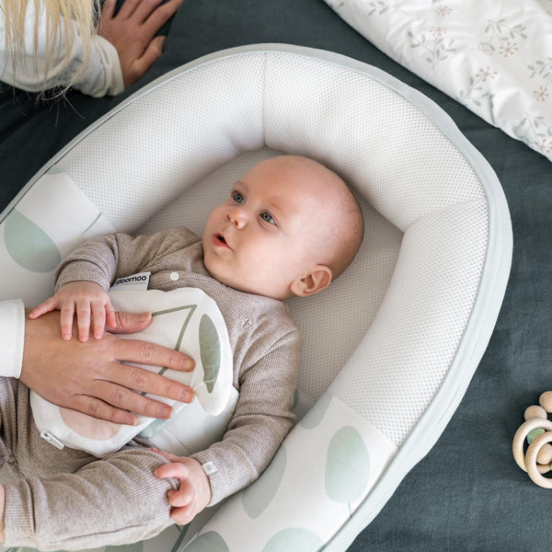 Doomoo Baby Nest din bumbac organic Cocoon 0m+ Leaves Aqua Green