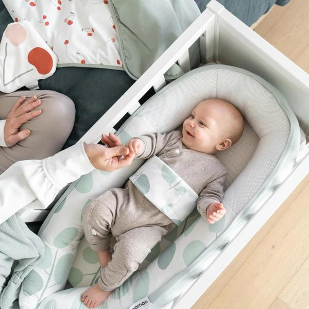 Doomoo Baby Nest din bumbac organic Cocoon 0m+ Leaves Aqua Green