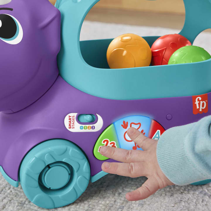 Fisher Price jucarie interactiva Prieten Dino cu mingi 12-36 luni