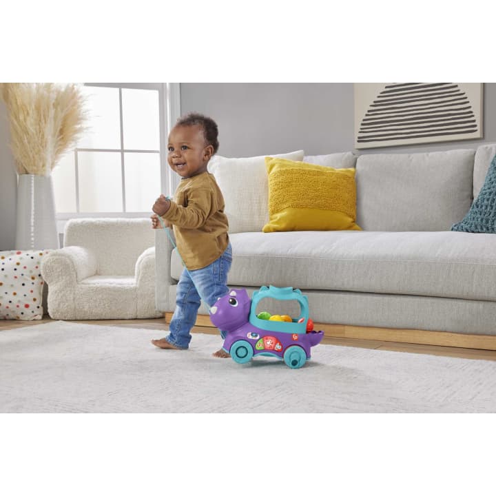 Fisher Price jucarie interactiva Prieten Dino cu mingi 12-36 luni
