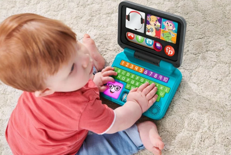 Fisher Price laptop interactiv in iimba romana 6-36 luni