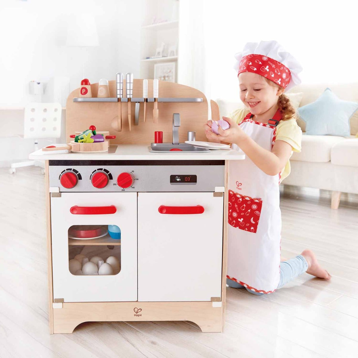 Hape set imbracaminte Micul chef 3 ani+